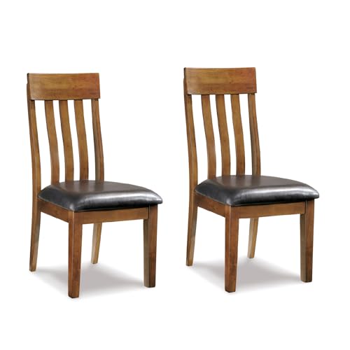 Signature Design by Ashley Ralene Rake Back 19" Dining Room Chair 2 Count, Medium Brown | Transitional style, Rake back wood chairs, Medium brown finish, Easy to clean faux leather seats, Kitchen dining use - color: Light Brown, style: 0