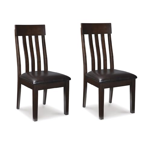 Signature Design by Ashley Haddigan Faux Leather Cushioned Rake Back Dining Chair, 2 Count, Dark Brown | Easy-to-clean faux leather upholstery, Wood frame and wood products and other construction, Supportive rake-back design - color: Dark Brown, style: 0