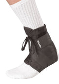 MUELLER Sports Medicine Soft Ankle Brace with Straps, Ankle Pain Relief Support for Men and Women, Ideal for Sprains, Strains, Arthritis, Black, X-Small - size: X-Small