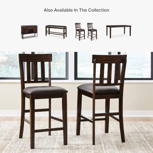 Signature Design by Ashley Haddigan Upholstered Barstool, 2 Count, Slat Back Design, Cushioned Seat, Wood, 25.5" H, Dark Brown | Easy-clean faux leather cushioned seat, Casual farmhouse wood slat back design, 25.6-inch seat height for kitchen islands - co