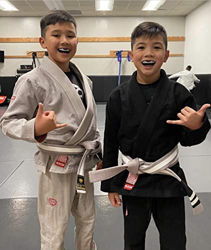 Oral Mart Youth Sports Mouth Guard for Kids (USA Flag, Fangs, 20+ Colors to Choose from) Mouthguard for Football, MMA, Karate, Boxing, Rugby, BJJ, Flag Football – /w Case (Youth, Strapless) - color: Fangs / Vampire