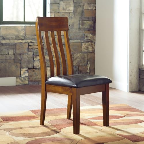 Signature Design by Ashley Ralene Rake Back 19" Dining Room Chair 2 Count, Medium Brown | Transitional style, Rake back wood chairs, Medium brown finish, Easy to clean faux leather seats, Kitchen dining use - color: Light Brown, style: 0